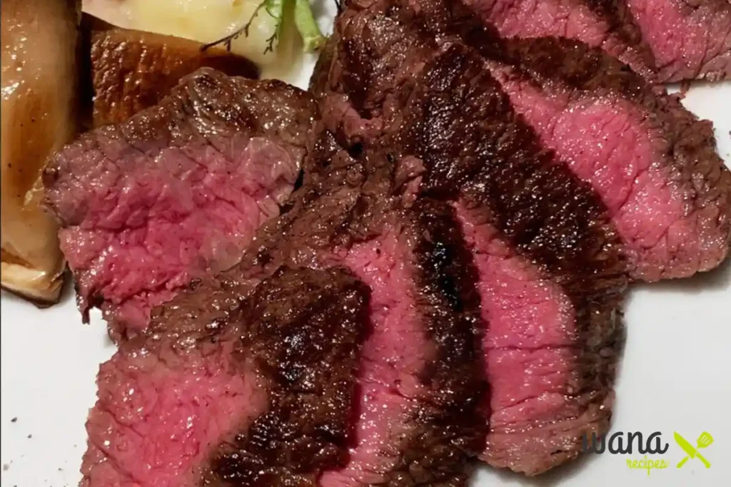 Grilled slices of medium-rare sandhill crane meat served with roasted vegetables.